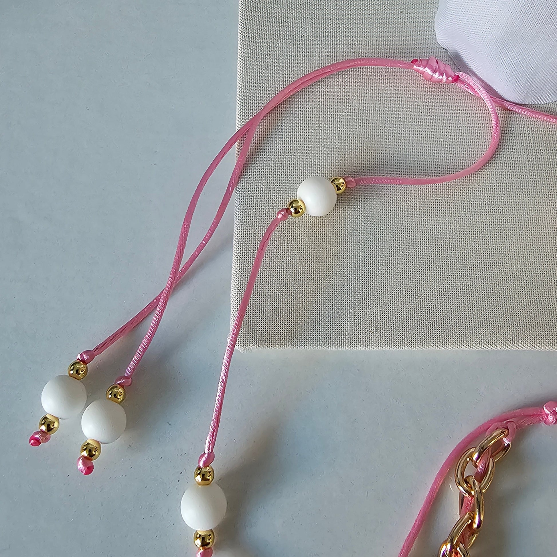 Necklace it's adjustable so it's easier to put it on and take it off. 